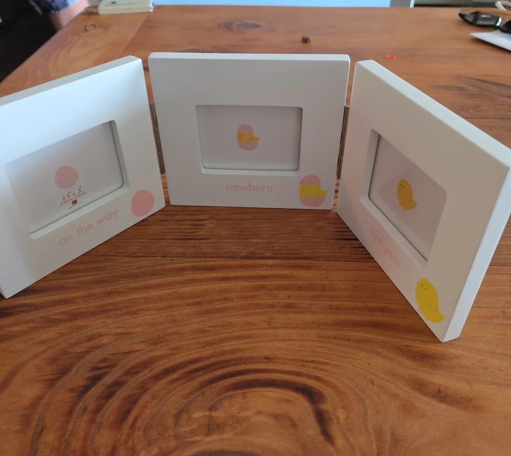 White Newborn Triple Picture Frame with Yellow Accents